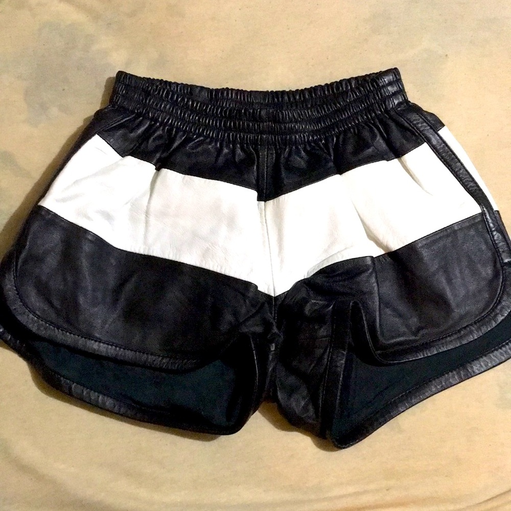 Love Leather high waisted short shorts. Leather. soft on inside. Shiny outside.